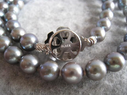 Akoya pearl necklace 7.0-7.5mm pearls with silver fittings, 42cm length, displayed on white background