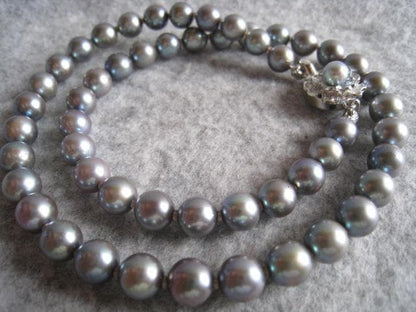 Akoya pearl necklace 7.0-7.5mm pearls with silver fittings, 42cm length, displayed on white background
