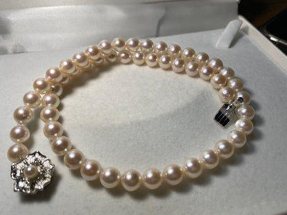 Seto Inland Sea Akoya pearl necklace with over 50 pearls, 7.8mm diameter, 43cm length, and silver clasp