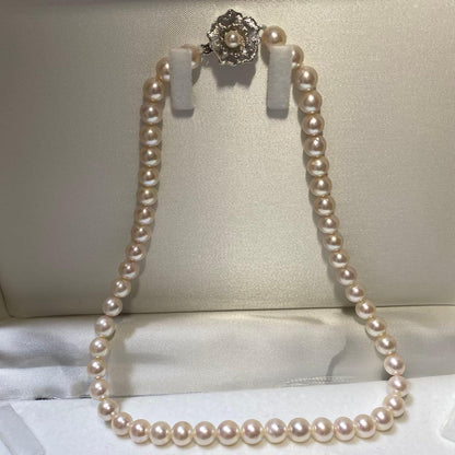 Seto Inland Sea Akoya pearl necklace with over 50 pearls, 7.8mm diameter, 43cm length, and silver clasp