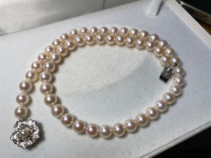 Seto Inland Sea Akoya pearl necklace with over 50 pearls, 7.8mm diameter, 43cm length, and silver clasp