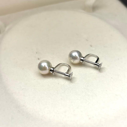 Akoya pearl necklace and matching earrings set with white 8mm pearls on a 43cm chain