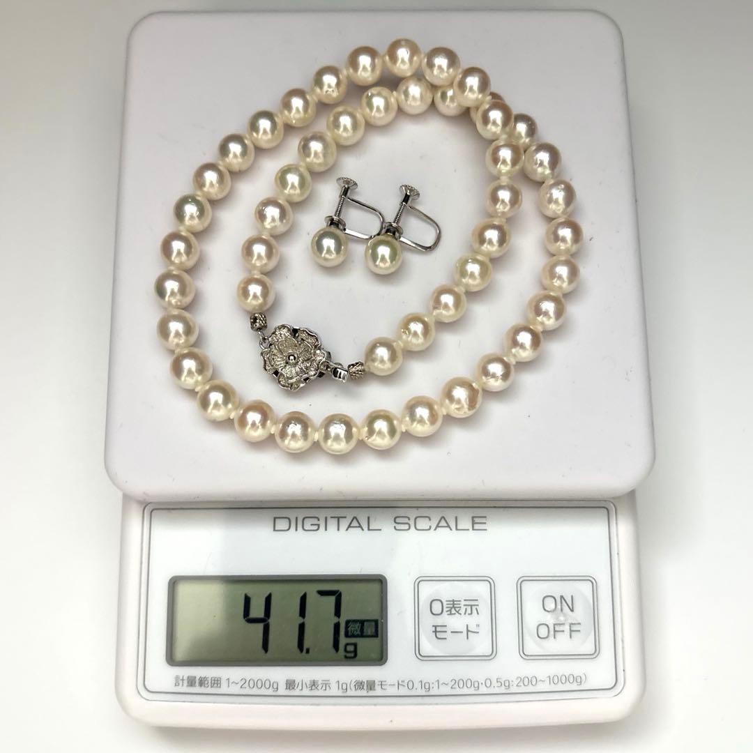 Akoya pearl necklace and matching earrings set with white 8mm pearls on a 43cm chain