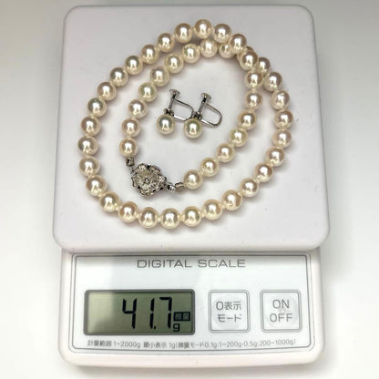 Akoya pearl necklace and matching earrings set with white 8mm pearls on a 43cm chain