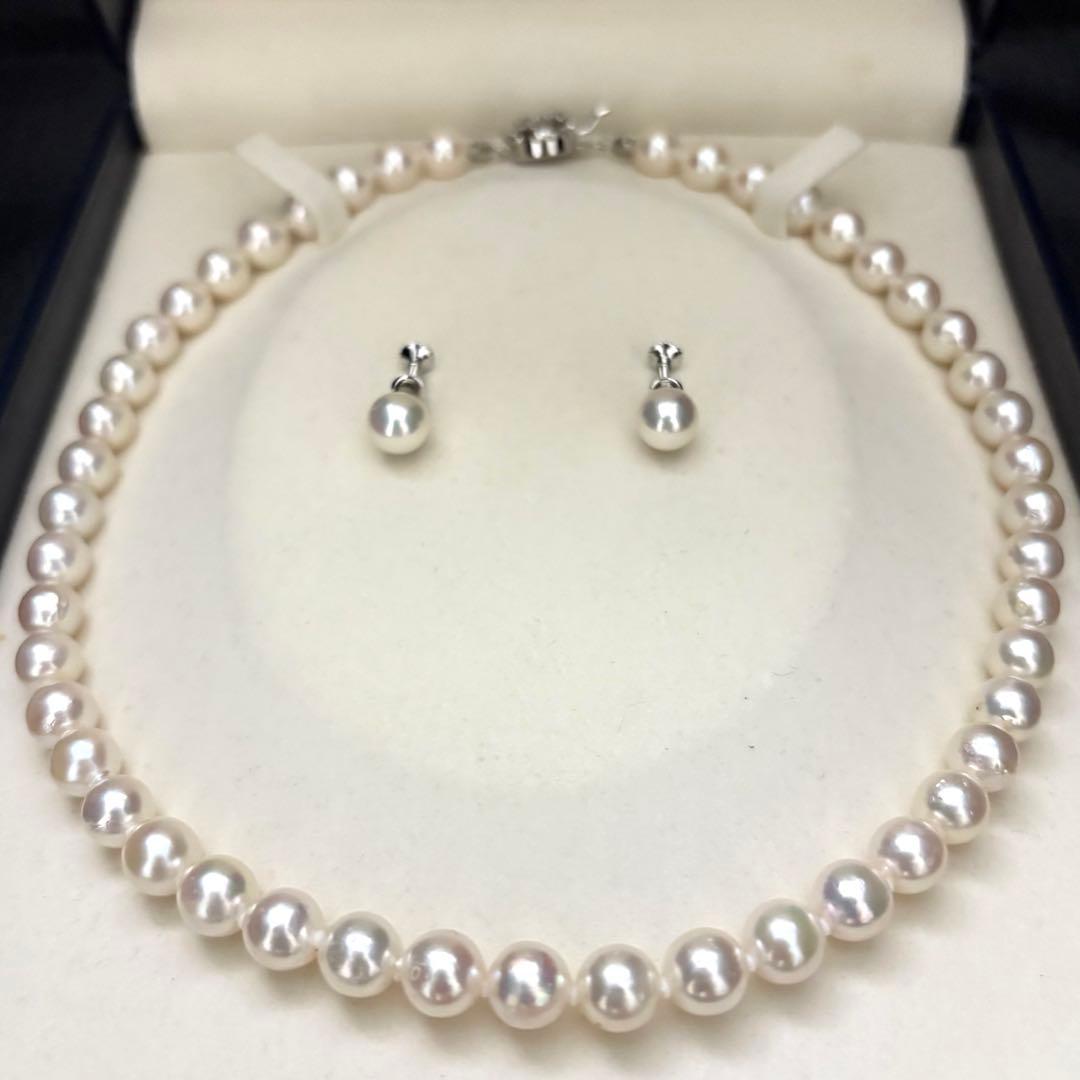 Akoya pearl necklace and matching earrings set with white 8mm pearls on a 43cm chain