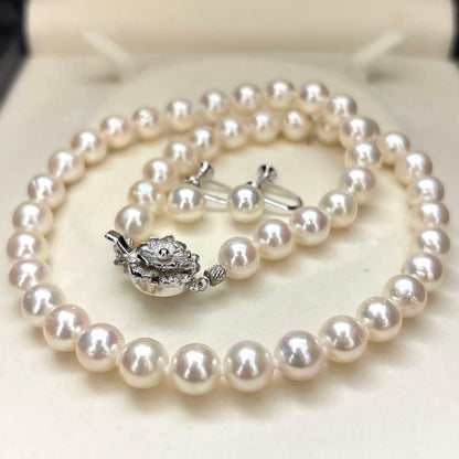Akoya pearl necklace and matching earrings set with white 8mm pearls on a 43cm chain