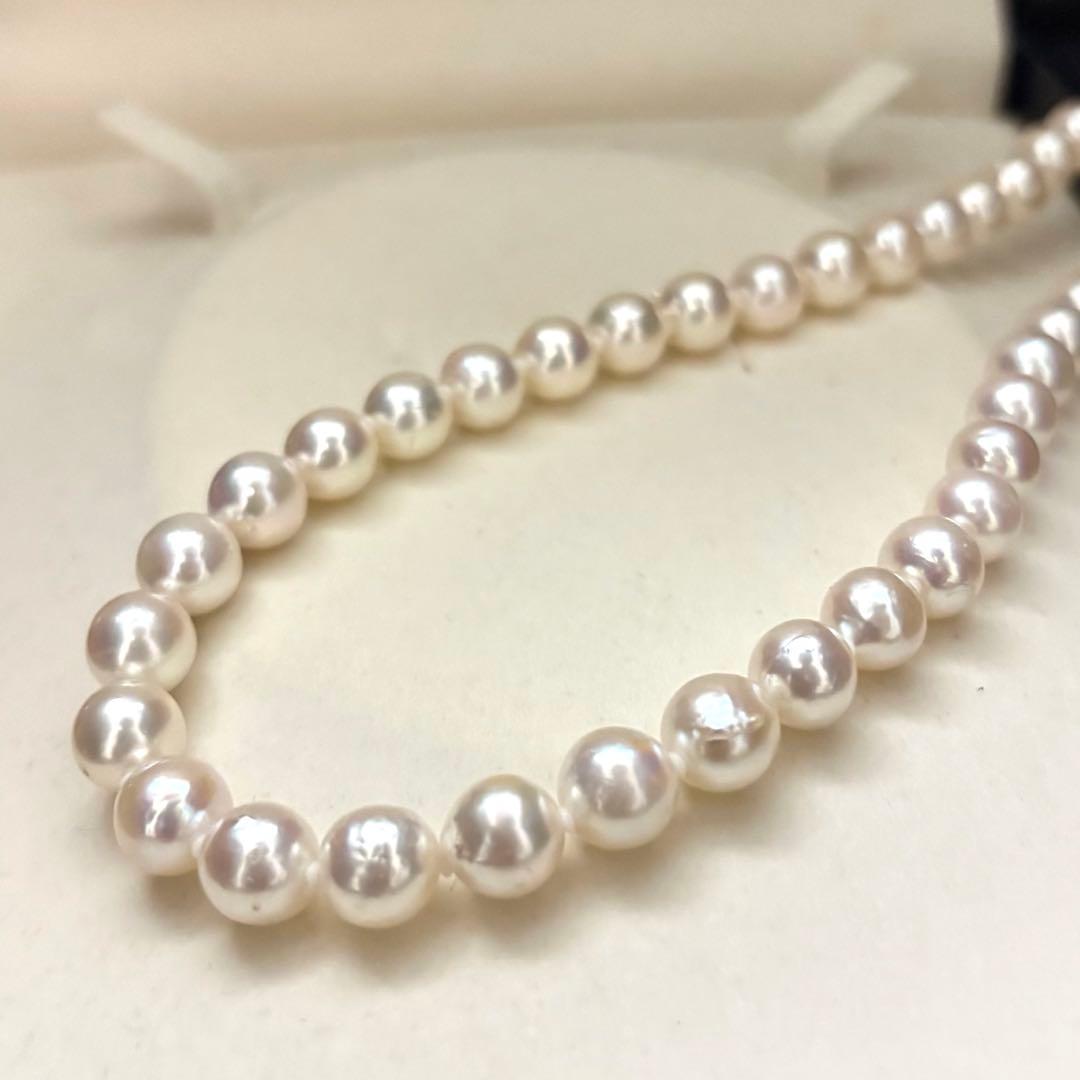 Akoya pearl necklace and matching earrings set with white 8mm pearls on a 43cm chain
