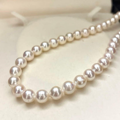 Akoya pearl necklace and matching earrings set with white 8mm pearls on a 43cm chain