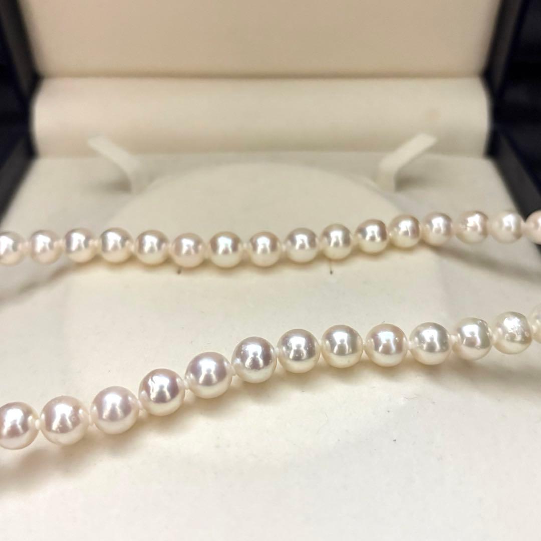 Akoya pearl necklace and matching earrings set with white 8mm pearls on a 43cm chain