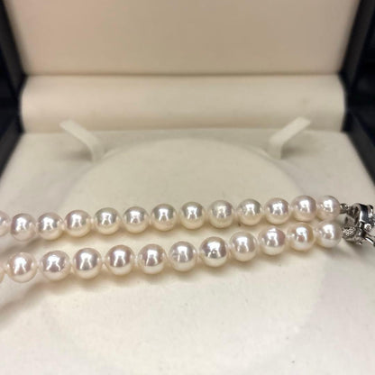 Akoya pearl necklace and matching earrings set with white 8mm pearls on a 43cm chain