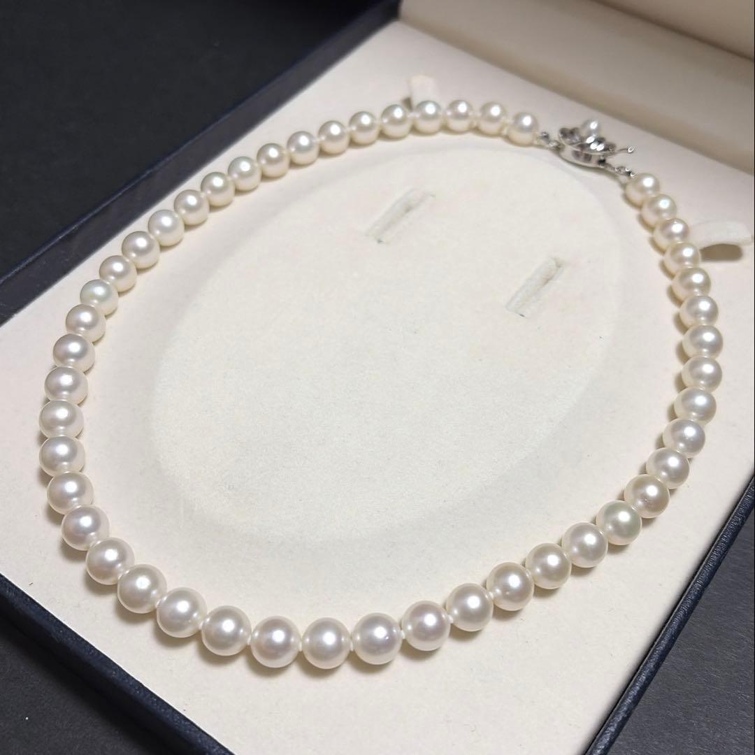 Odawa Tasaki Akoya pearl necklace with 8.5mm genuine pearls and 42 cm length displayed on white background