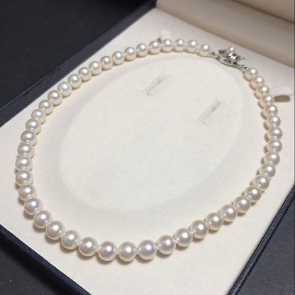 Odawa Tasaki Akoya pearl necklace with 8.5mm genuine pearls and 42 cm length displayed on white background