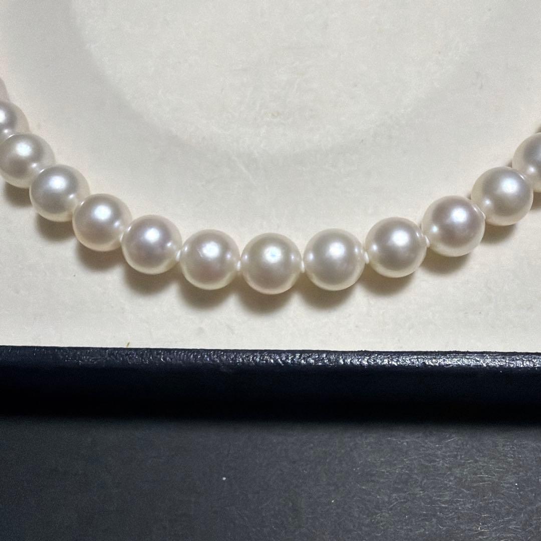 Odawa Tasaki Akoya pearl necklace with 8.5mm genuine pearls and 42 cm length displayed on white background