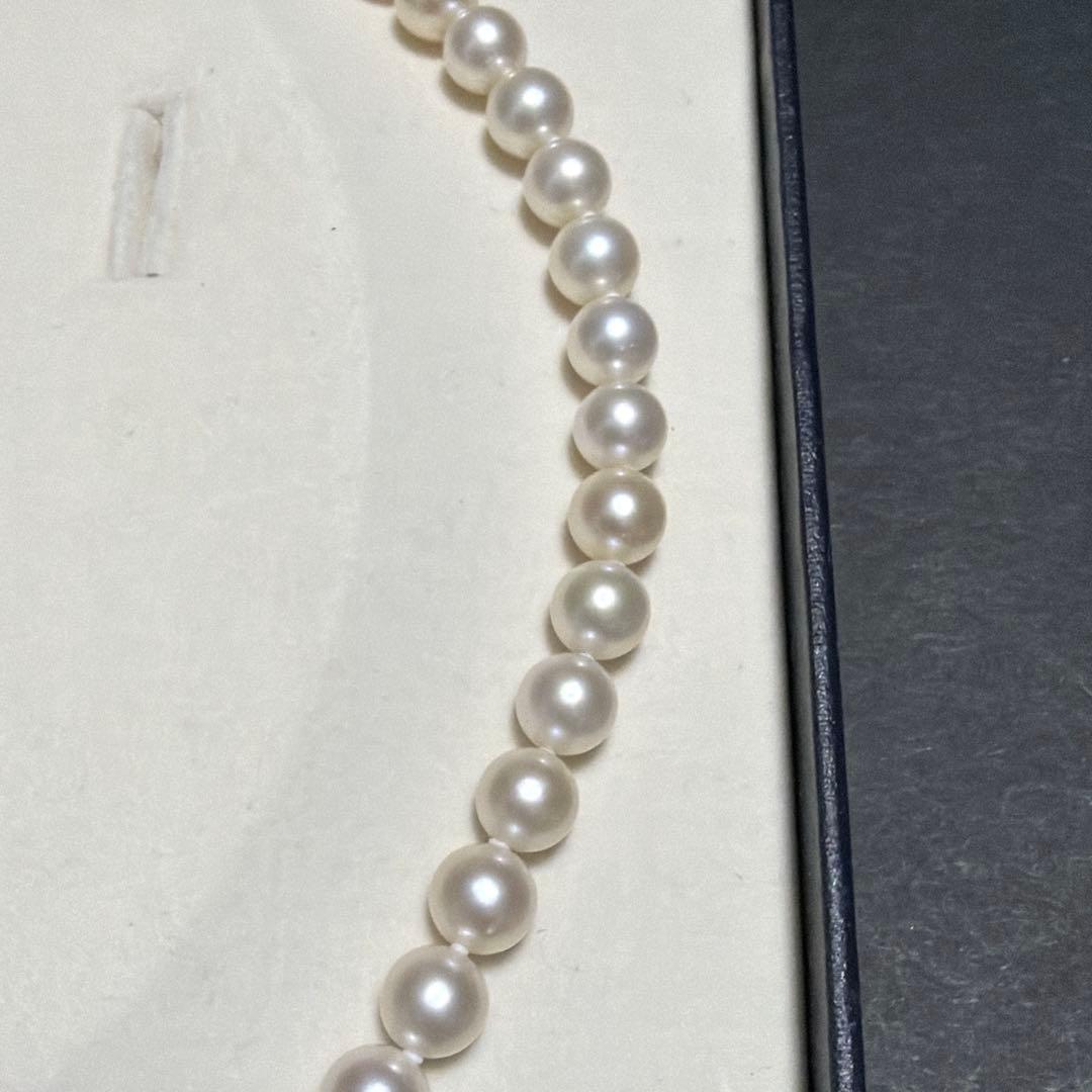 Odawa Tasaki Akoya pearl necklace with 8.5mm genuine pearls and 42 cm length displayed on white background