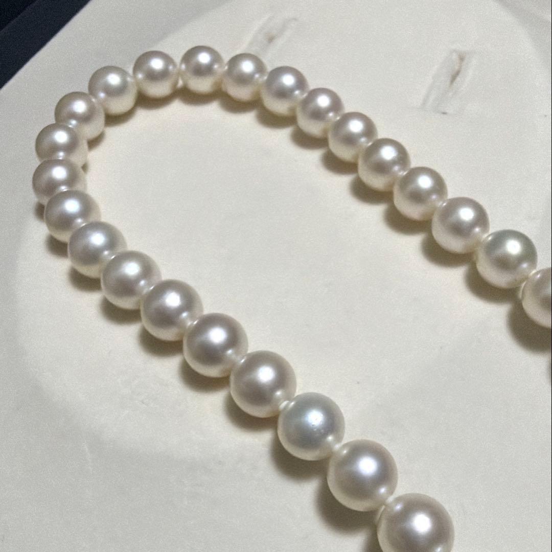 Odawa Tasaki Akoya pearl necklace with 8.5mm genuine pearls and 42 cm length displayed on white background
