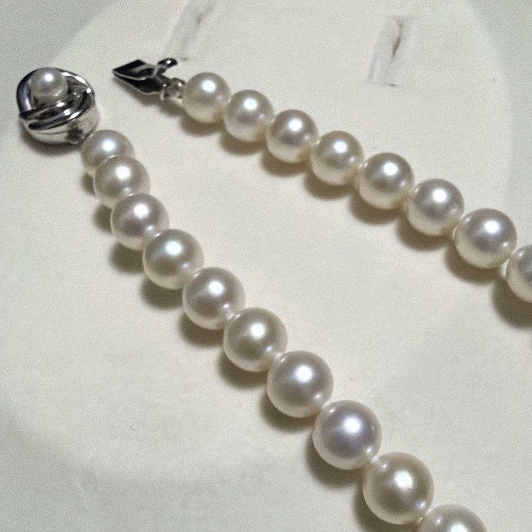 Odawa Tasaki Akoya pearl necklace with 8.5mm genuine pearls and 42 cm length displayed on white background