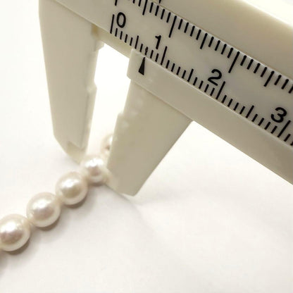 Honshu Akoya formal pearl necklace with 7mm white pearls and silver stamped clasp, 42.5cm length