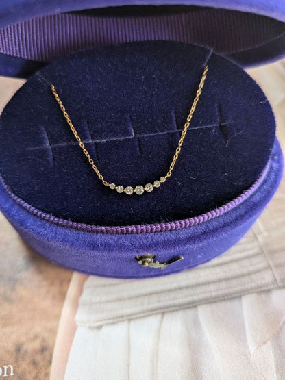 Agate K18 necklace featuring 0.1ct diamond with adjustable slide chain on white background