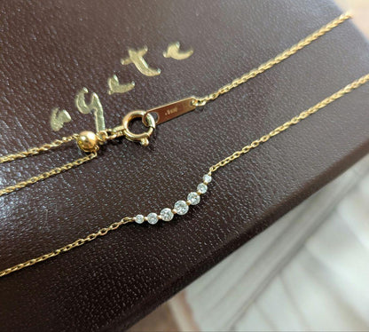 Agate K18 necklace featuring 0.1ct diamond with adjustable slide chain on white background