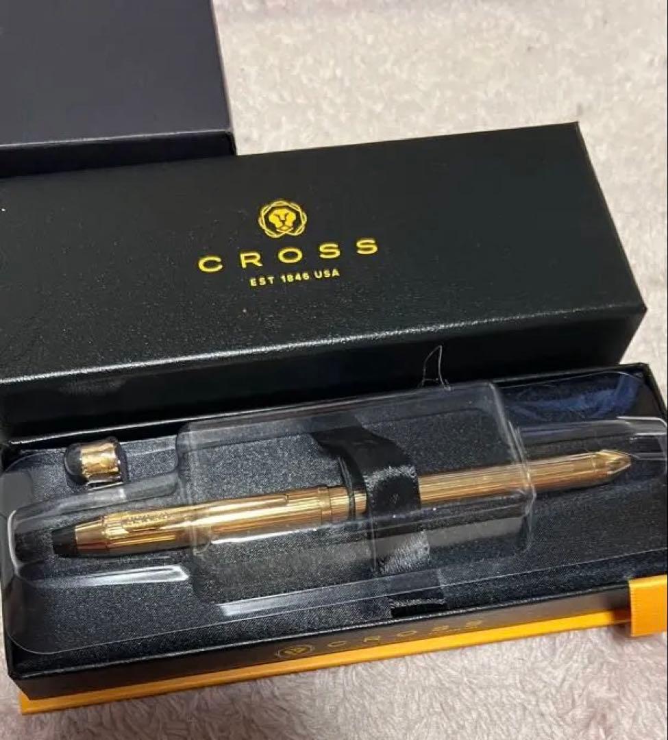 Cross ballpoint pen with gold tip and gold body, unused with name written, no box included