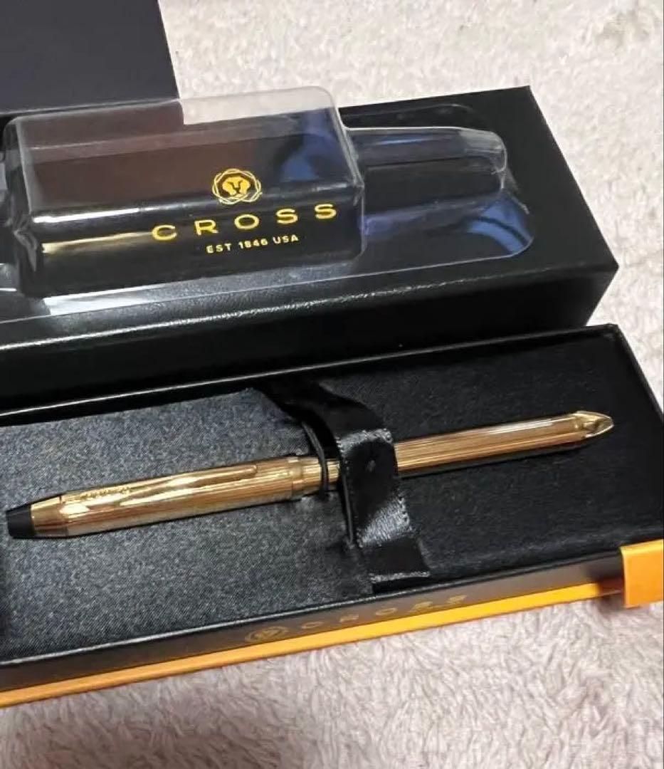 Cross ballpoint pen with gold tip and gold body, unused with name written, no box included