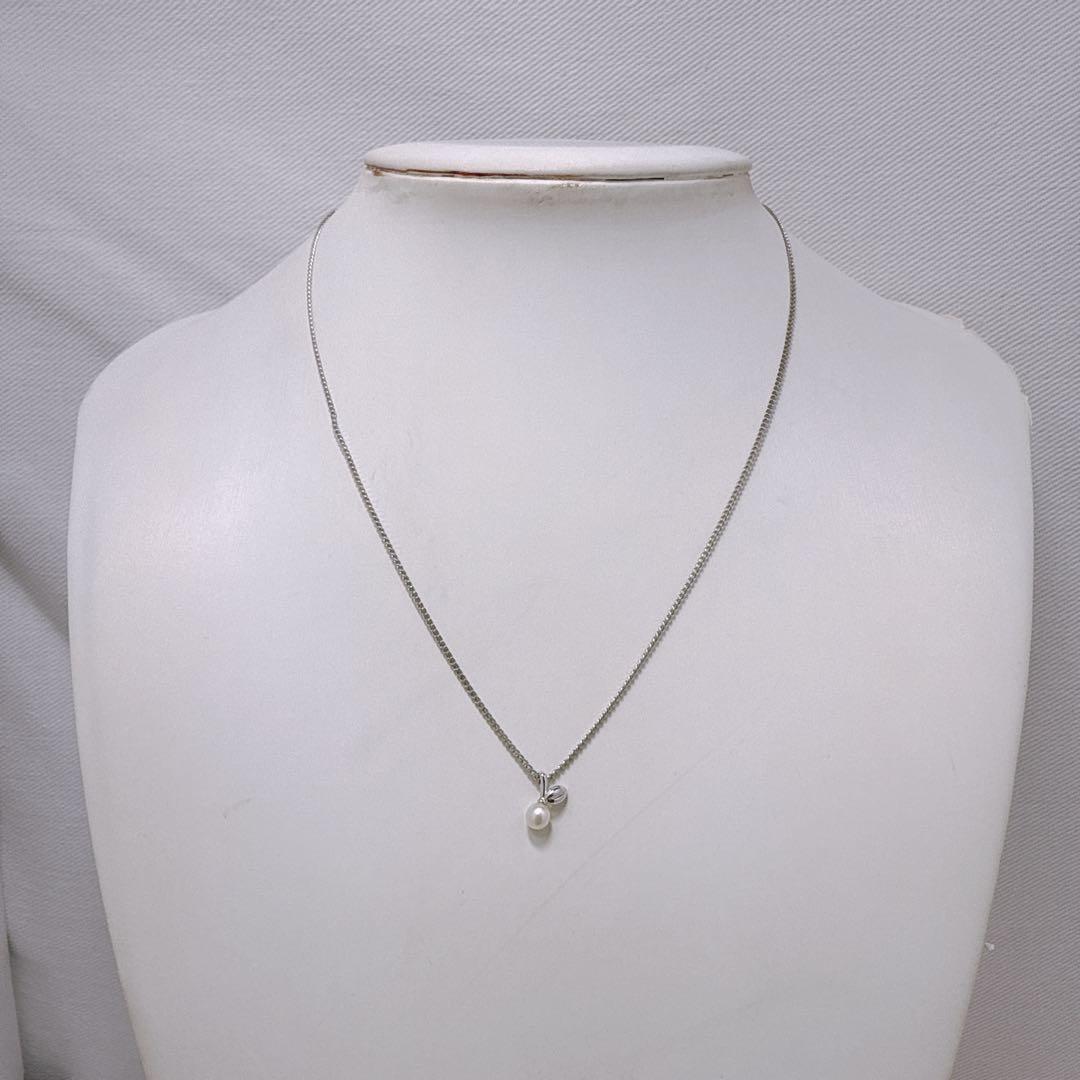 Tasaki Silver pendant necklace with single pearl and cherry fruit design on 41cm metal chain