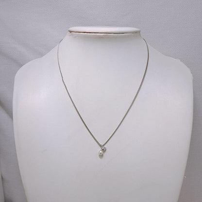 Tasaki Silver pendant necklace with single pearl and cherry fruit design on 41cm metal chain