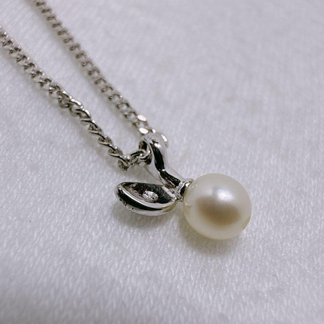 Tasaki Silver pendant necklace with single pearl and cherry fruit design on 41cm metal chain