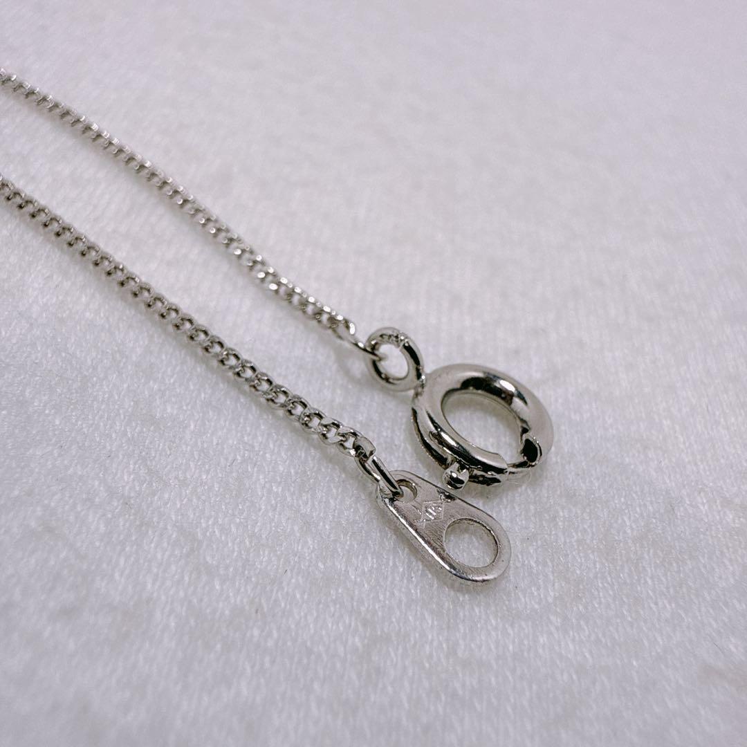 Tasaki Silver pendant necklace with single pearl and cherry fruit design on 41cm metal chain