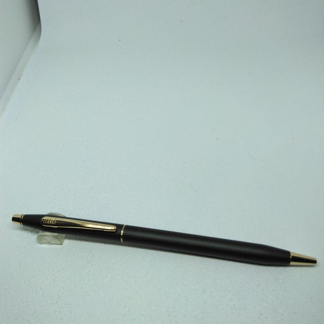 CROSS black ballpoint pen with gold accents displayed alongside its dedicated case