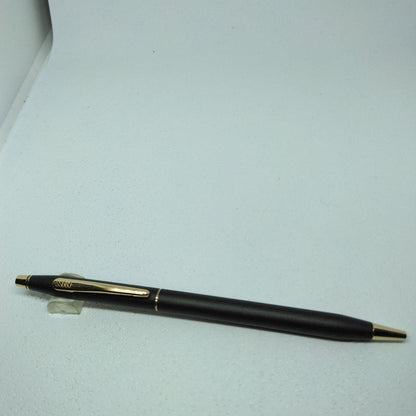 CROSS black ballpoint pen with gold accents displayed alongside its dedicated case