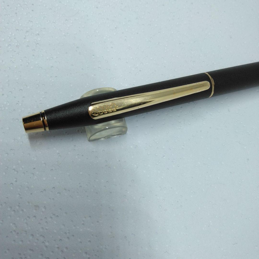 CROSS black ballpoint pen with gold accents displayed alongside its dedicated case