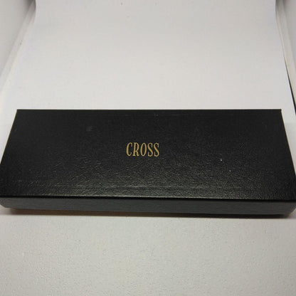 CROSS black ballpoint pen with gold accents displayed alongside its dedicated case