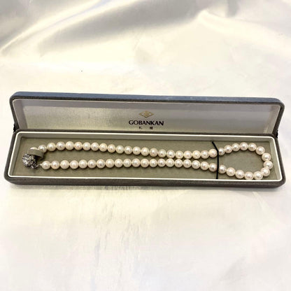 Akoya real pearl necklace with 7.0-7.5mm white pearls showing pink and green shades on a 44cm strand