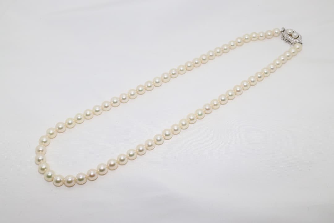 Tasaki pearl necklace featuring genuine 6.2mm pearls with impressed markings on a 42.5cm strand