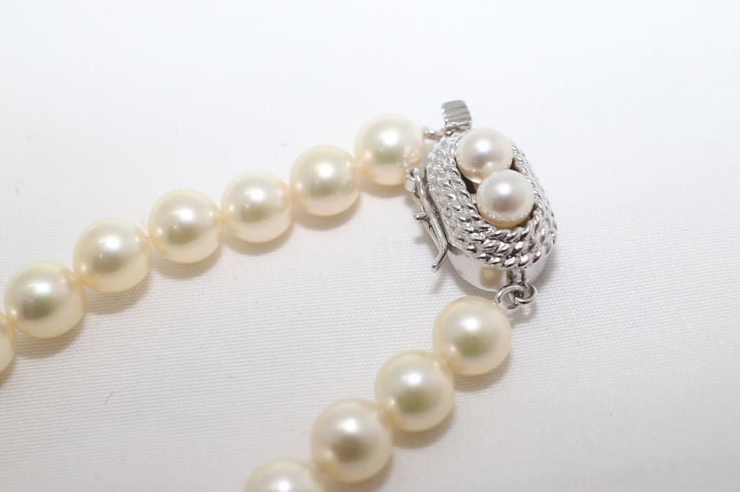 Tasaki pearl necklace featuring genuine 6.2mm pearls with impressed markings on a 42.5cm strand