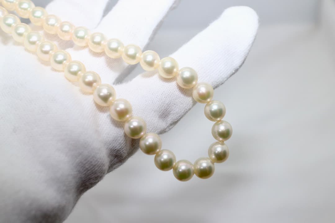 Tasaki pearl necklace featuring genuine 6.2mm pearls with impressed markings on a 42.5cm strand