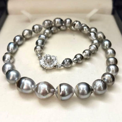 Black pearl necklace with silver 13mm pendant and pearls sized 8.5-13mm on a 47cm chain