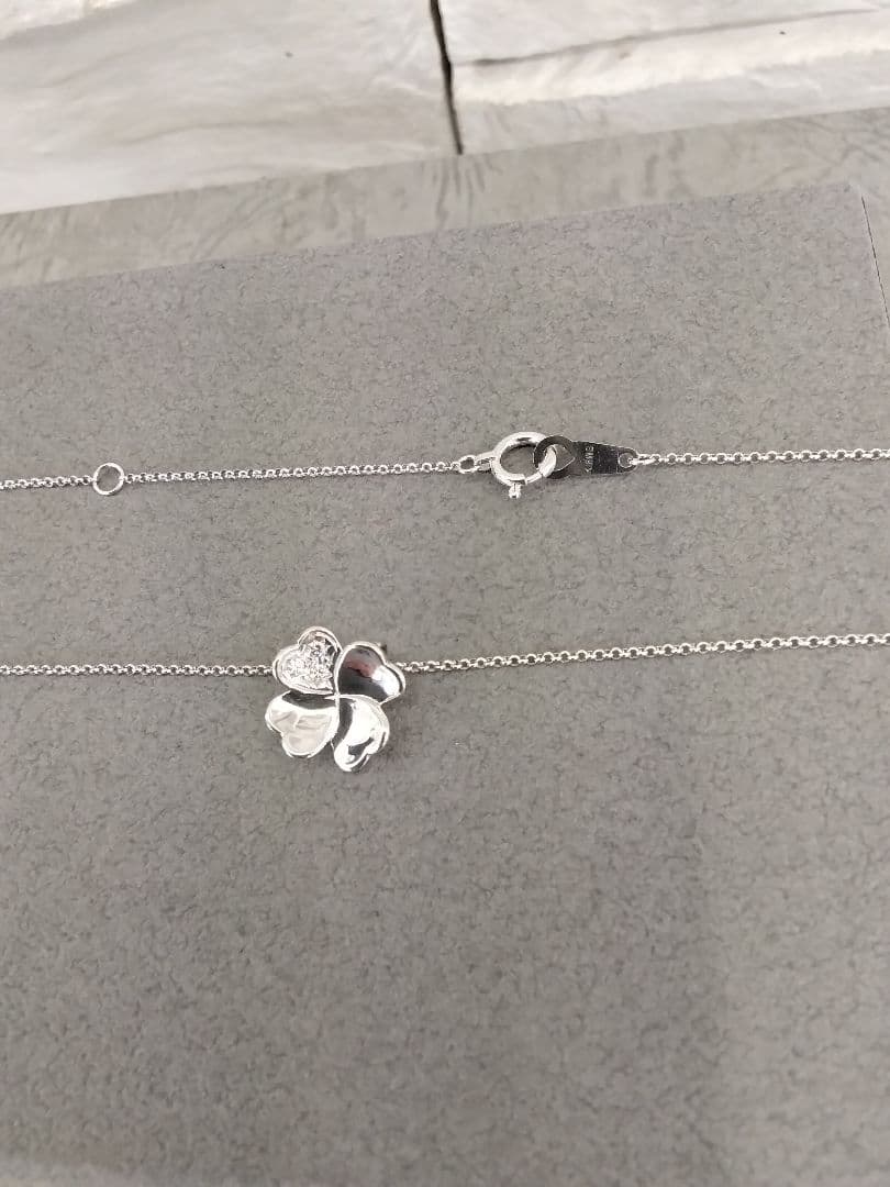 TASAKI K18 white gold necklace with 0.02 carat diamond pendant measuring 11mm by 11mm on a 41cm chain