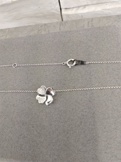 TASAKI K18 white gold necklace with 0.02 carat diamond pendant measuring 11mm by 11mm on a 41cm chain