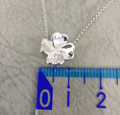TASAKI K18 white gold necklace with 0.02 carat diamond pendant measuring 11mm by 11mm on a 41cm chain