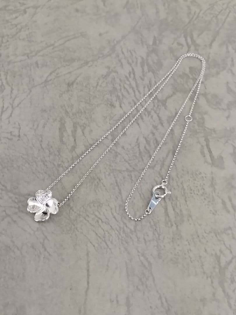 TASAKI K18 white gold necklace with 0.02 carat diamond pendant measuring 11mm by 11mm on a 41cm chain