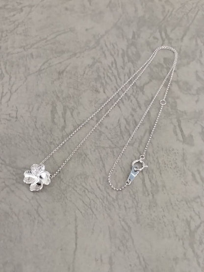 TASAKI K18 white gold necklace with 0.02 carat diamond pendant measuring 11mm by 11mm on a 41cm chain