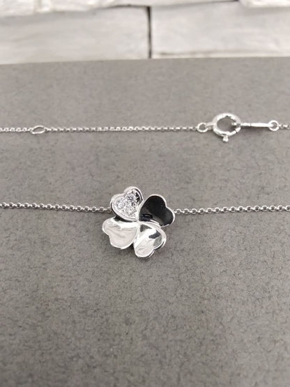 TASAKI K18 white gold necklace with 0.02 carat diamond pendant measuring 11mm by 11mm on a 41cm chain