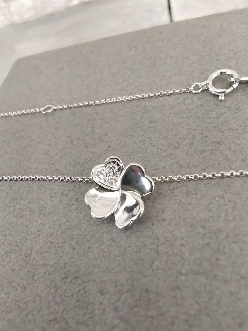 TASAKI K18 white gold necklace with 0.02 carat diamond pendant measuring 11mm by 11mm on a 41cm chain