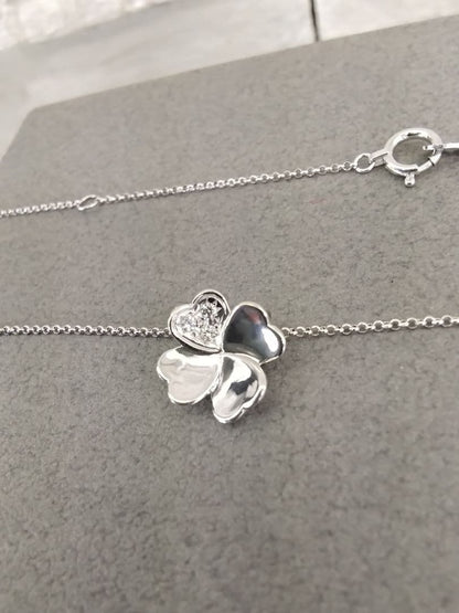 TASAKI K18 white gold necklace with 0.02 carat diamond pendant measuring 11mm by 11mm on a 41cm chain