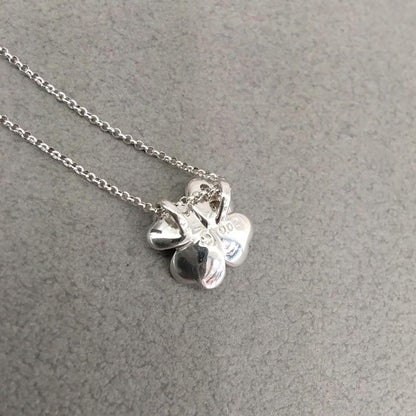 TASAKI K18 white gold necklace with 0.02 carat diamond pendant measuring 11mm by 11mm on a 41cm chain