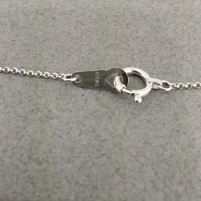 TASAKI K18 white gold necklace with 0.02 carat diamond pendant measuring 11mm by 11mm on a 41cm chain