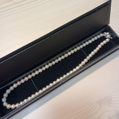Akoya pearl necklace featuring white pink 6mm pearls strung on a 42cm chain