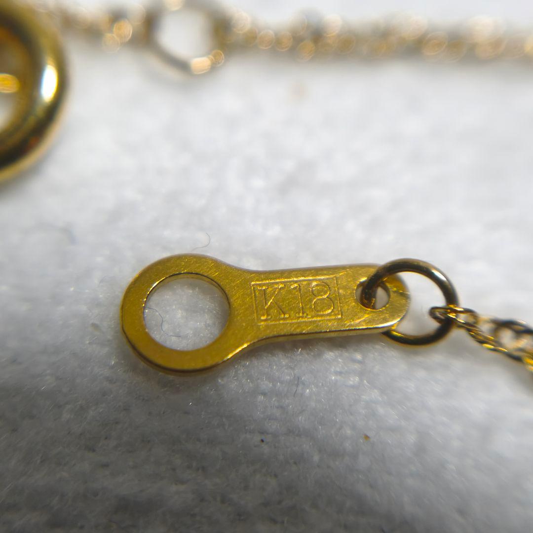 Close-up of Agate K18 screw chain necklace with 41cm length on white background